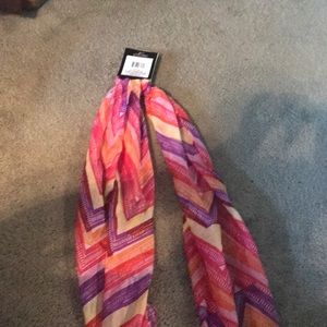 Pink, purple, yellow, orange and red scarf.